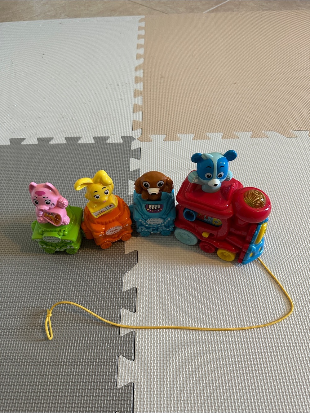 Colorful Pull-Along Train with Animal Cars - Red, Blue, Green, Orange, Pink